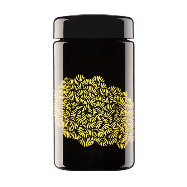 A glossy black cylindrical container with a matching black lid, featuring a prominent yellow floral pattern on the front, set against a plain white background.