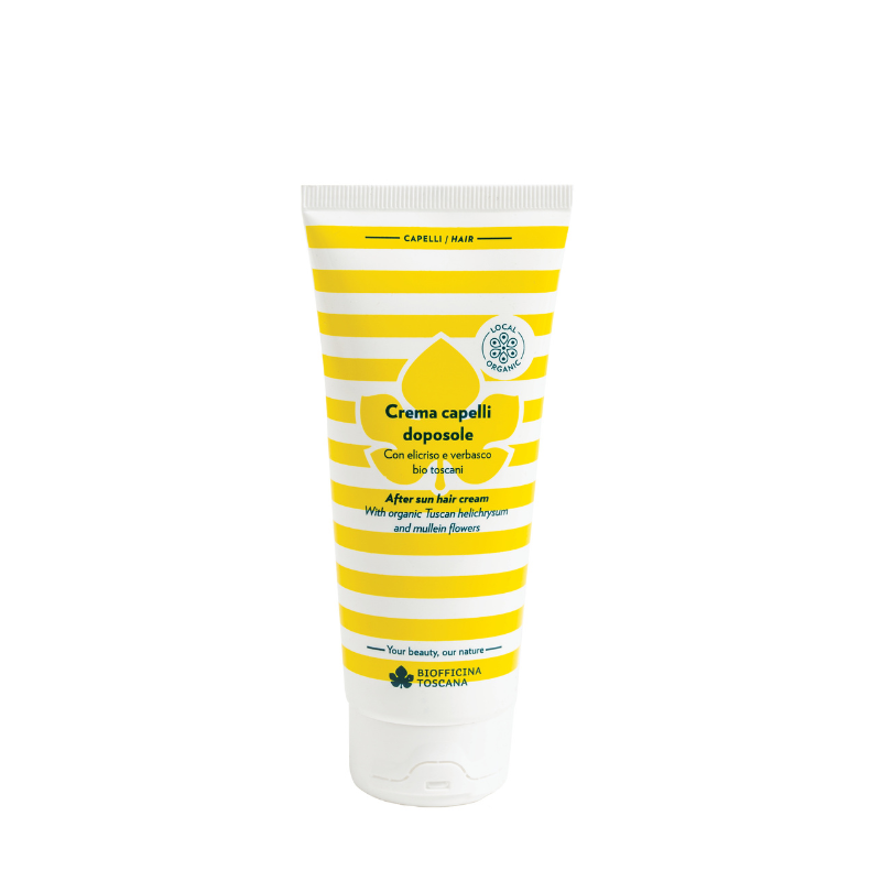 A tube of Biofficina Toscana after sun hair cream, featuring a white and yellow striped design with a yellow droplet graphic on the label. Moisturizing, frizz-taming after-sun treatment for hair exposed to sun and salt water.