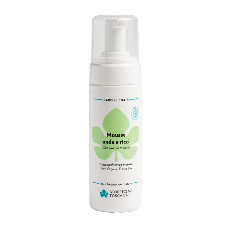 A white pump bottle of Biofficina Toscana Curl and Wave Mousse for hair, featuring a green leaf logo and black and blue text on a clean white background. Lightweight styling mousse for bouncier, more defined curls and waves, even in humidity.