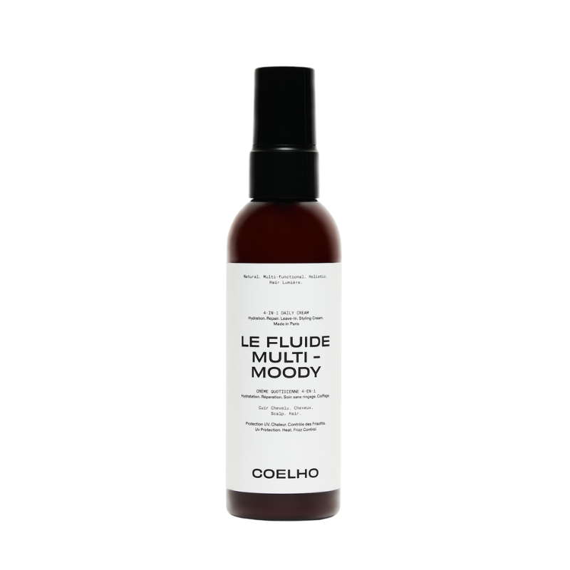 A bottle of COELHO Le Fluide Multi-Moody hair product, featuring a dark amber brown bottle, a black spray nozzle, and a clean white label with black text, set against a plain white background.