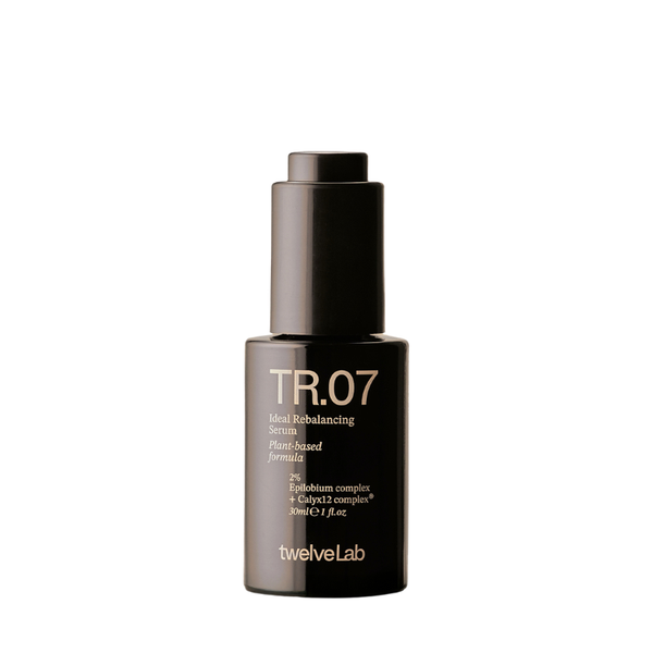 A black bottle of twelveLab TR.07 Rebalancing Serum with gold lettering, centered on a plain white background.