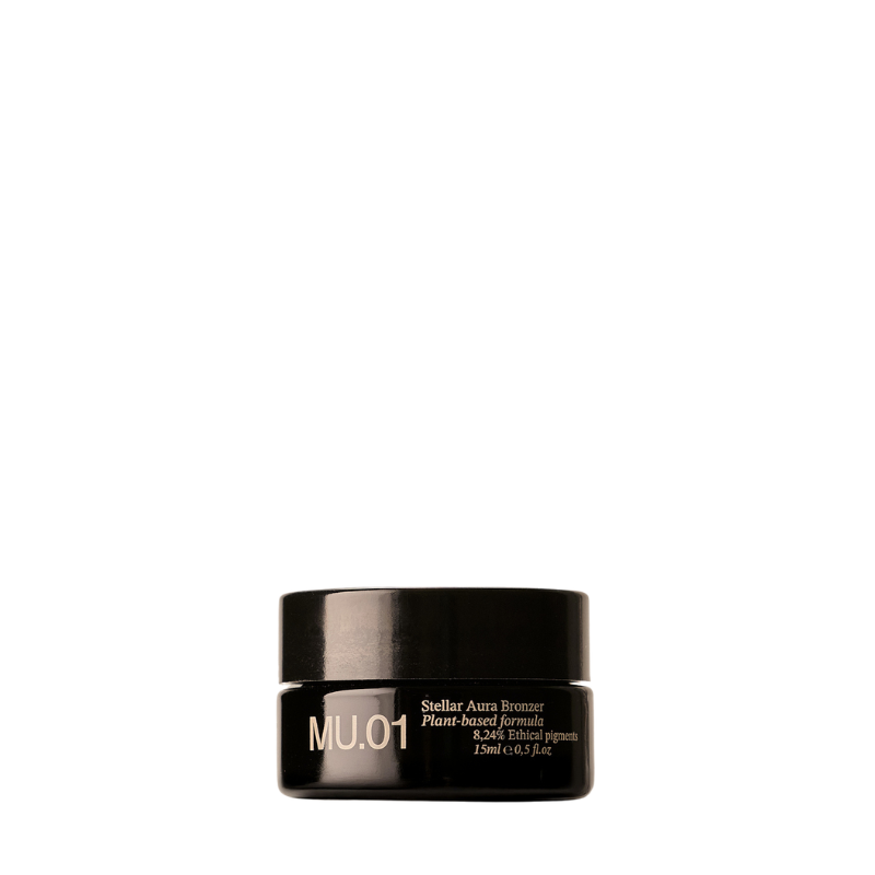 A black cosmetic jar of MU.01 Stellar Aura Bronzer plant-based formula, 15ml, on a solid white background.